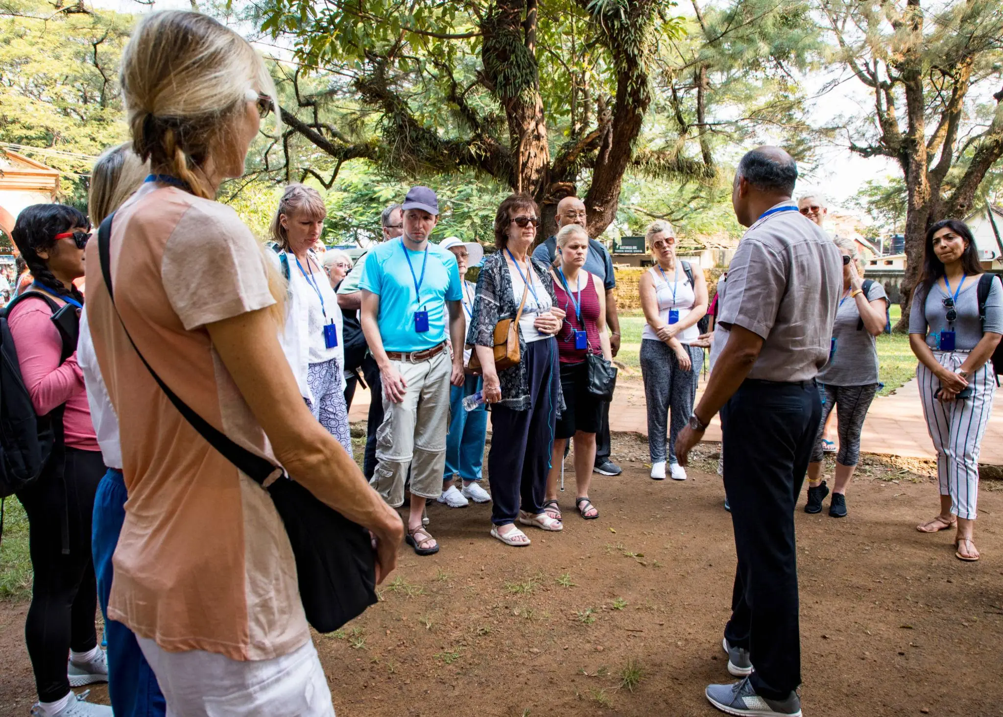 Group of travelers enjoying guided tour with best group travel company in India